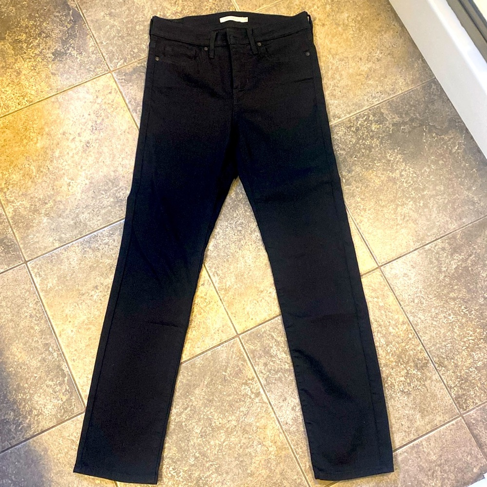 Never worn! Levi’s 312 slim black denim, size 28